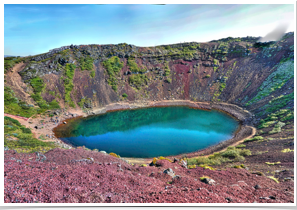 A crater lake filled with rain water.
